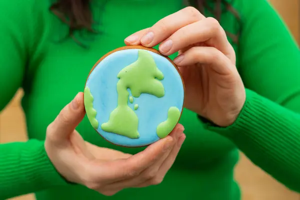 Earth Day Concept Gingerbread Shape Planet Hands Woman Stock Photo