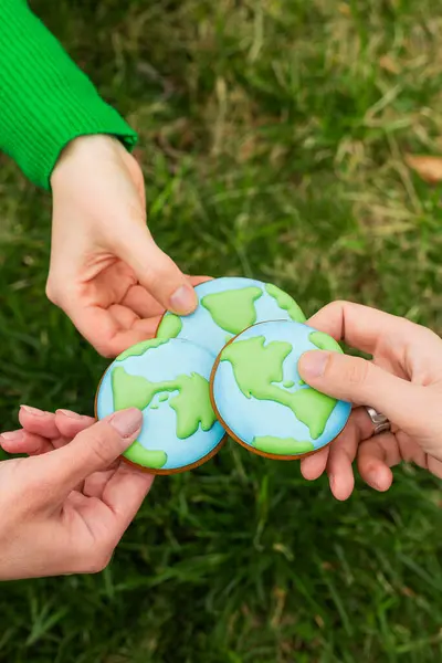 Earth Day Concept Hands Hold Gingerbread Shape Earth Care Environment Stock Picture