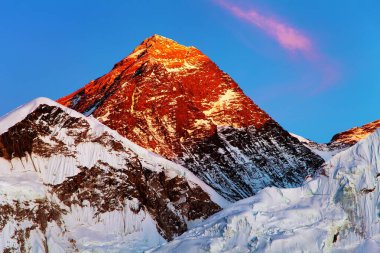 Mount Everest from Kala Patthar, evening colored view with small cloud on the top, Khumbu valley, Solukhumbu, Sagarmatha national park, Nepal Himalayas mountains