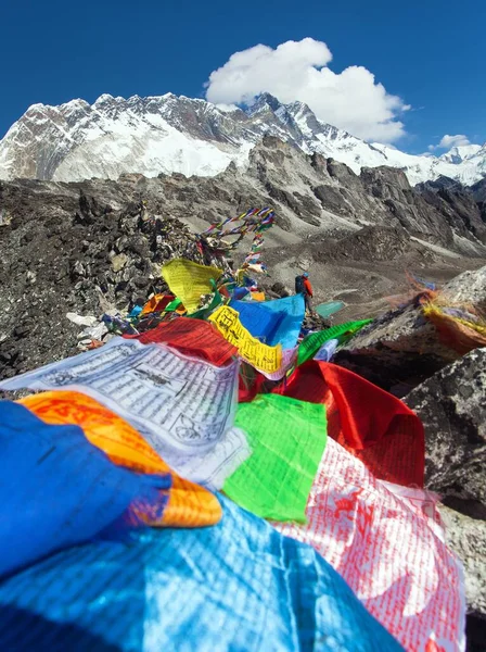 view of Lhotse peak with prayer flags from Kongma La pass, way to Everest base camp and three passes trek, Nepal Nimalayas mountains