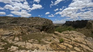 Isalo National Park. Panoramic view of wilderness landscape with water erosion into rocky outcrops, plateaus, extensive plains and deep canyons. Beautiful Madagascar panorama landscape with blue sky.