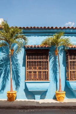 Beautiful building in historic city Cartagena de Indias with beautiful colonial architecture. The one of most beautiful town in Caribbean Coast Region, Colombia. clipart
