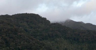 Beautiful view on the hills and rainforest surrounding San Gerardo de Dota in mist, beautiful Costa Rica Wilderness landscape