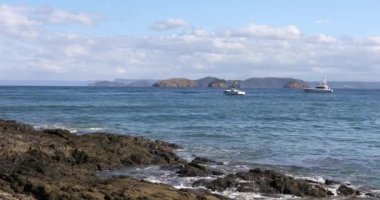 Playa Ocotal with Pacific ocean waves on sandy beach, El Coco Costa Rica. Famous snorkel beach. Picturesque paradise tropical landscape. Pura Vida concept, travel to exotic tropical country.