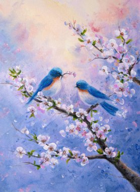 İki mavi kuş, narin kiraz çiçekleriyle süslenmiş bir dala tünemiş tatlı tatlı etkileşim içinde. Yumuşak pastel arka plan, sakin bir bahar atmosferini çağrıştırıyor..