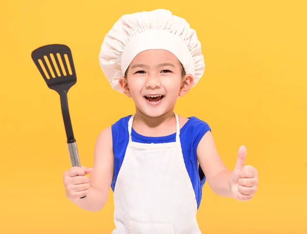 Happy Little Boy Chef Uniform Showing Thumbs Yellow Background — Stock Photo, Image