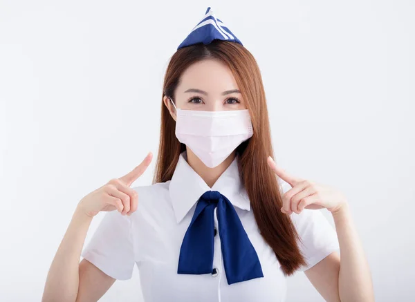 Młoda Kobieta Stewardesa Mundurze Białą Maską — Zdjęcie stockowe
