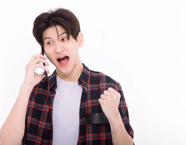 Nadšený Mladý Muž Mluví Telefonu Ukazuje Ano Gesto — Stock fotografie