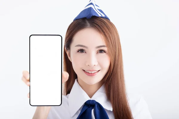 Gyönyörű Légitársaság Stewardess Mutatja Mobiltelefon Üres Képernyő Fehér Háttér — Stock Fotó
