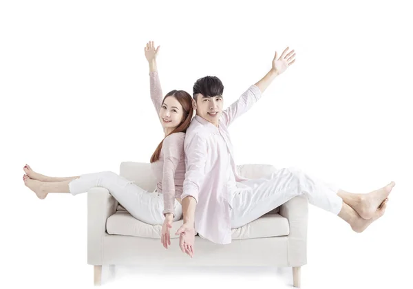 Happy Young Couple Sitting Sofa White Background — Stock Photo, Image