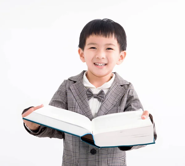 Ευτυχισμένο Παιδί Που Κρατάει Και Σπουδάζει Βιβλίο — Φωτογραφία Αρχείου