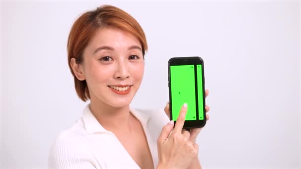 Happy Young Woman Showing Green Screen Smartphone — Stock Video