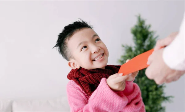 Happy Asian Little Boy Receiving Red Envelope Celebrating Chinese New — Stock Photo, Image