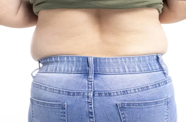 バックビュー 脂肪の女性は太りすぎを持っています ストックフォト