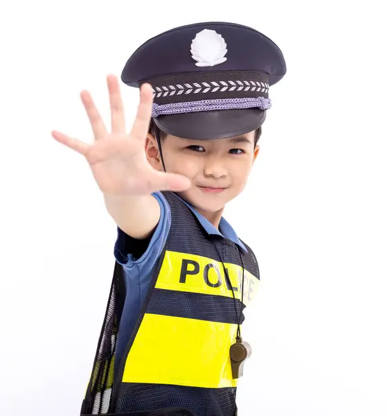 Ребенок Одет Офицер Полиции Стоя Показывая Знак Стоп Стоковое Изображение