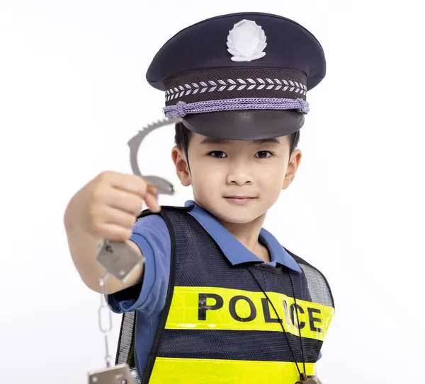 Child Dressed Police Officer Standing Showing Handcuffs Stock Picture