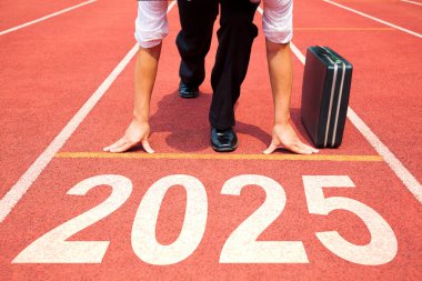 Happy new year 2025 concept. Business Man preparing to run on athletics track engraved with the year 2025. Getting ready for the new year clipart