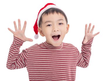 Noel Baba kılığındaki Asyalı çocuk beyazlar içinde soyutlanmış.