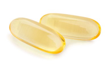 Vitamin hapları beyaz yolda izole edilmiş