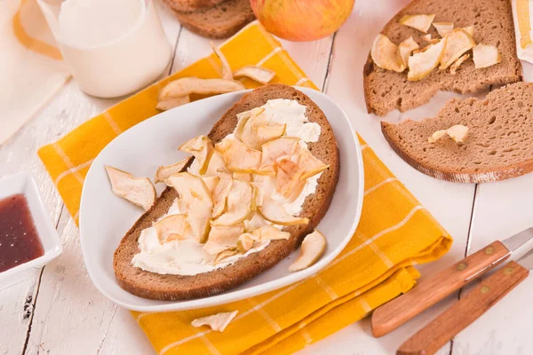 Rye bread with apple in crispy slices with skin.