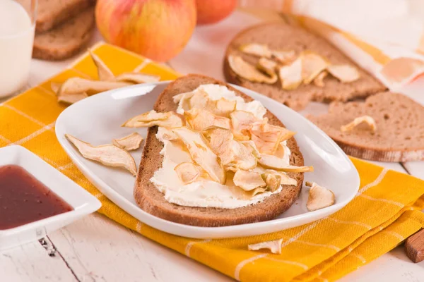 Rye bread with apple in crispy slices with skin.