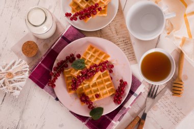Waffles red currant and mint.