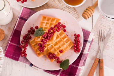 Waffles red currant and mint.
