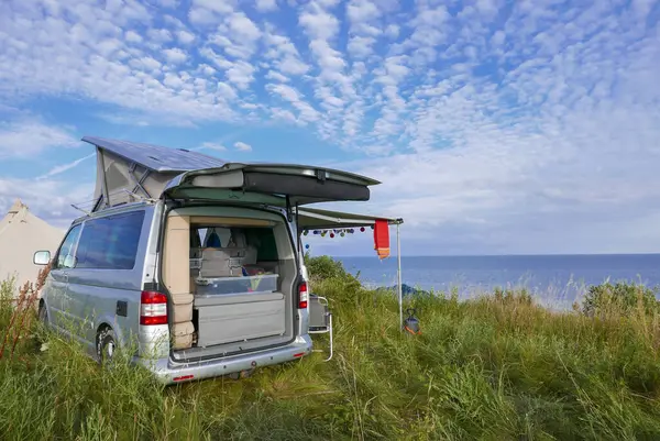 Perfect camping set up with a small mobilhgome facing the ocean in Denmark