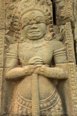 Angkor Thom 'da Angkor Wat yakınlarında fil terası duvarına oyulmuş Apsara' nın detayları. Siem Reap 'teki UNESCO simgesi. Kamboçya