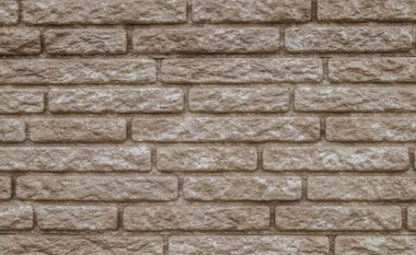 Arkaplan olarak tuğla işçiliği altında duvar dekorasyonu için plastik paneller
