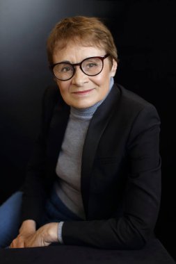 portrait of beautiful woman in her 70+ age mature grandmother happy