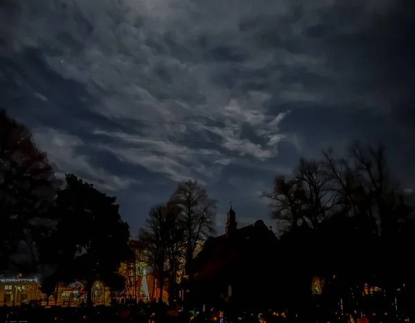 Night with clear sky over the church and cemetery in Kalety Miotek, Poland.
