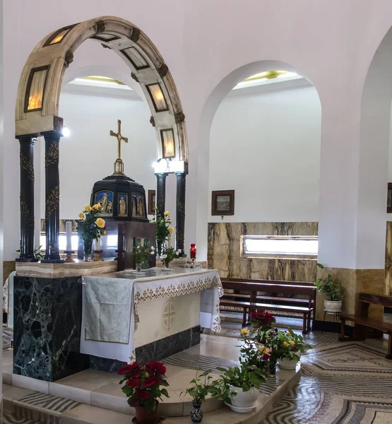 stock image Mount of Beatitudes. Israel. January 27, 2020: Interior of the church on the Mount of Beatitudes in Israel, on the Sea of Galilee, Visible content of the blessings on stained glass and in the Bible.