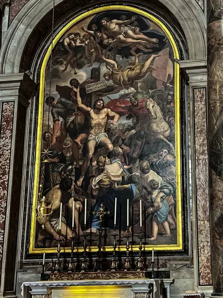 stock image Vatican City, Vatican, September 24, 2023: Chapel of Saint Sebastian in the Basilica of Saint. Peter in Rome. Picture with Saint Sebastian chained to a tree and studded with arrows and the grave of Saint. John Paul II.