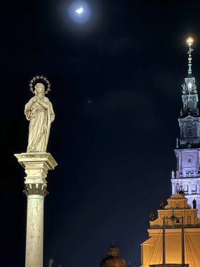 Czestochowa, Poland, February 15, 2024: Jasna Gora Monastery in Czestochowa at night.  Return to mother. clipart