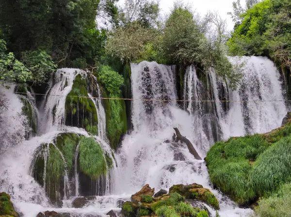 stock image Kravica Waterfall in Bosnia and Herzegovina. Unique natural beauty in the Trebizat River for holidays and leisure time.