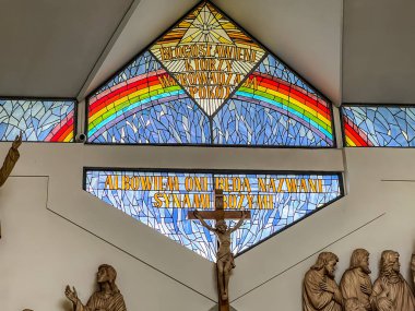 Siedlec, Poland, July 23, 2024: Sanctuary of Saint Padre Pio on Przeprosna Gorka near Czestochowa. Stained glass window in the upper church with the blessing: 