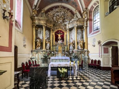 Swieta Anna, Poland, July 23, 2024: Church of St. Anne and monastery of Dominican nuns in Swieta Anna in Poland. Interior of the church with the main altar visible. clipart