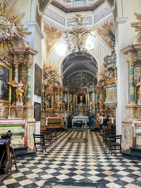 stock image Swieta Anna, Poland, July 23, 2024: Church of St. Anne and monastery of Dominican nuns in Swieta Anna in Poland. Interior of the church with the main altar visible.