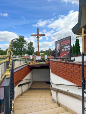 Siedlec, Poland, July 23, 2024: Sanctuary of Saint Padre Pio - a sanctuary located on Przeprosna Gorka in Siedlec near Czestochowa in Poland. Polish San Giovanni Rotondo. Entrance to the lower church. clipart