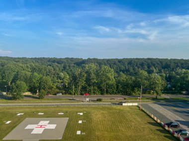 A landing site for helicopters prepared at the district hospital no. 3 in Tarnowskie Gory, Poland. clipart