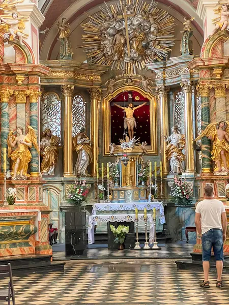 stock image Swieta Anna, Poland, July 23, 2024: Church of St. Anne and monastery of Dominican nuns in Swieta Anna in Poland. Interior of the church with the main altar visible.