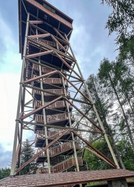 Lookout tower on the Malnik mountain near Muszyna in Poland. clipart