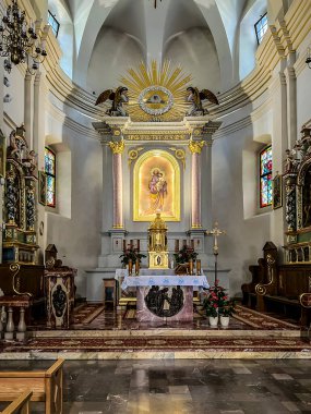 Muszyna, Poland, August 6, 2024: Interior of the Church of St. Joseph, Spouse of the Blessed Virgin Mary in Muszyna. clipart