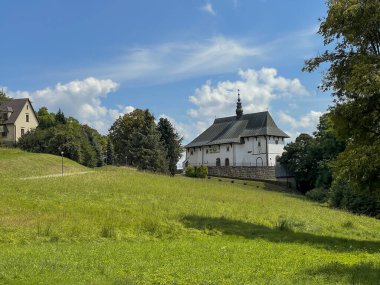 The parish church of Saints Andrew Swierad and Benedict in Tropie - Romanesque church from the turn of the 11th/12th century. One of the oldest in Lesser Poland. Sanctuary of St. Andrew Swierad and Benedict in Tropie. clipart