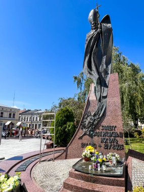 Nowy Sacz, Poland, August 7, 2024: Monument to Saint Pope John Paul II on the market square in Nowy Sacz, Poland. clipart