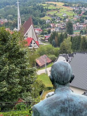 A view of Kroscienko in Poland towards the Church of the Good Shepherd from Kopia Gorka (from the Light-Life Movement Center). clipart