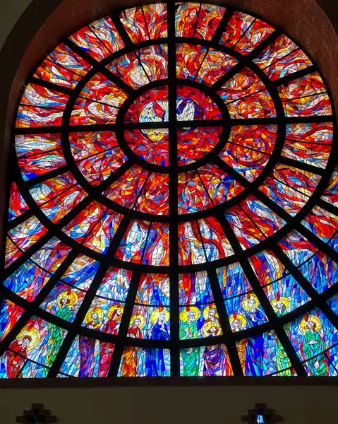 stock image Nowy Sacz, Poland, August 7, 2024: Sanctuary of St. Rita in Nowy Sacz, Poland. Interior, stained glass window depicting the descent of the Holy Spirit.