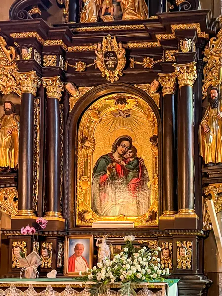 stock image Stary Sacz, Poland, August 4, 2024: Interior of the Church of the Holy Trinity and Saint Clara in Stary Sacz - Side altar, Our Lady of the Sorrows.