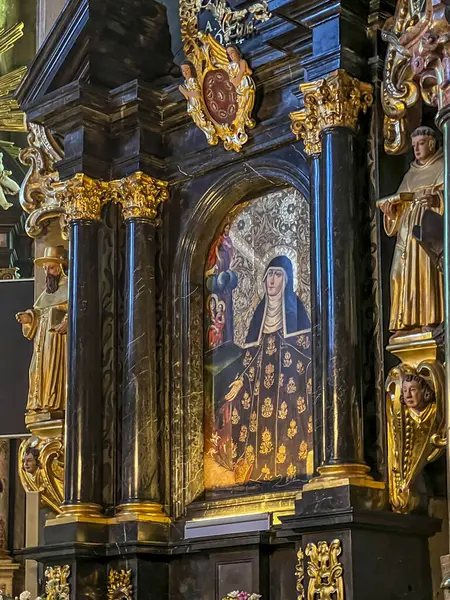 stock image Stary Sacz, Poland, August 4, 2024: Interior of the Church of the Holy Trinity and Saint Clara in Stary Sacz - Side altar, St. Kinga.